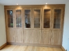 Bespoke cabinet, part glazed with integrated lighting