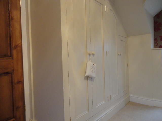 Bespoke wardrobe with angled doors